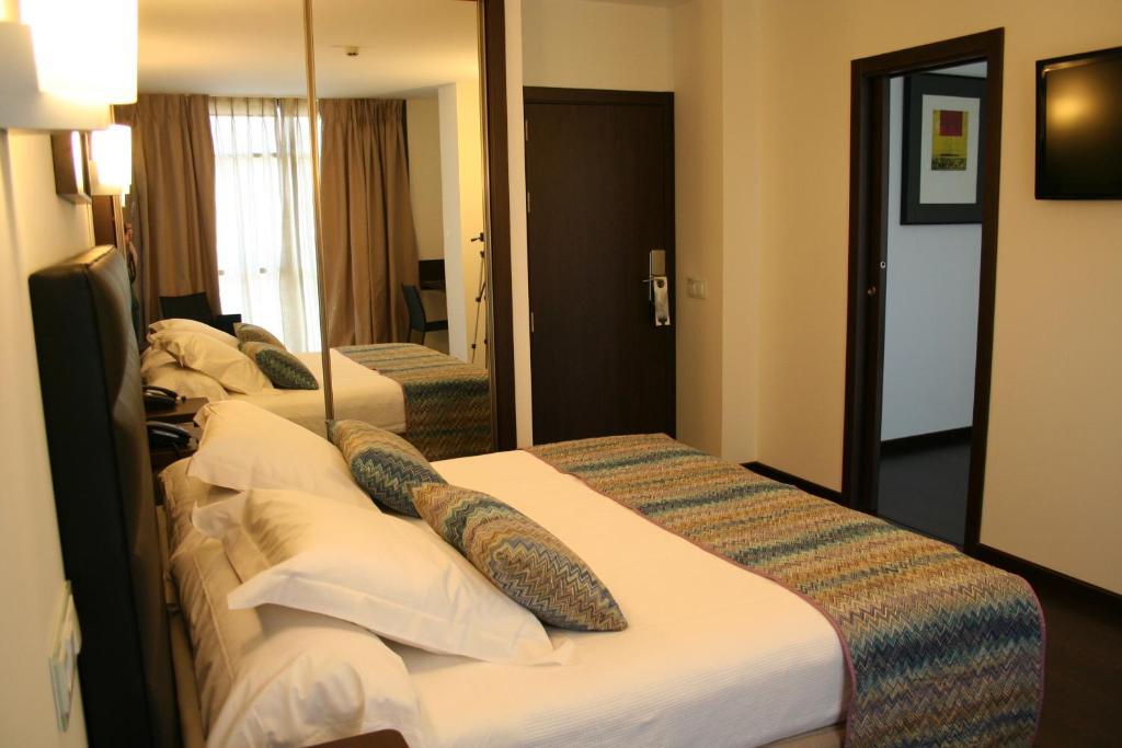 Hotel Villa Rosario Ii, Edificio Moderno ริวาเดเซญา ห้อง รูปภาพ